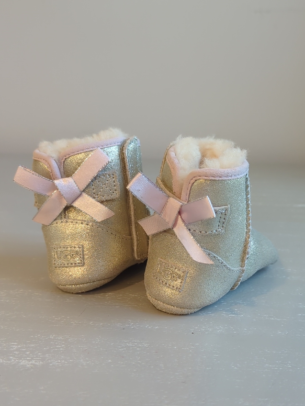 UGG Metallic Gold Baby Booties with Pink Bows